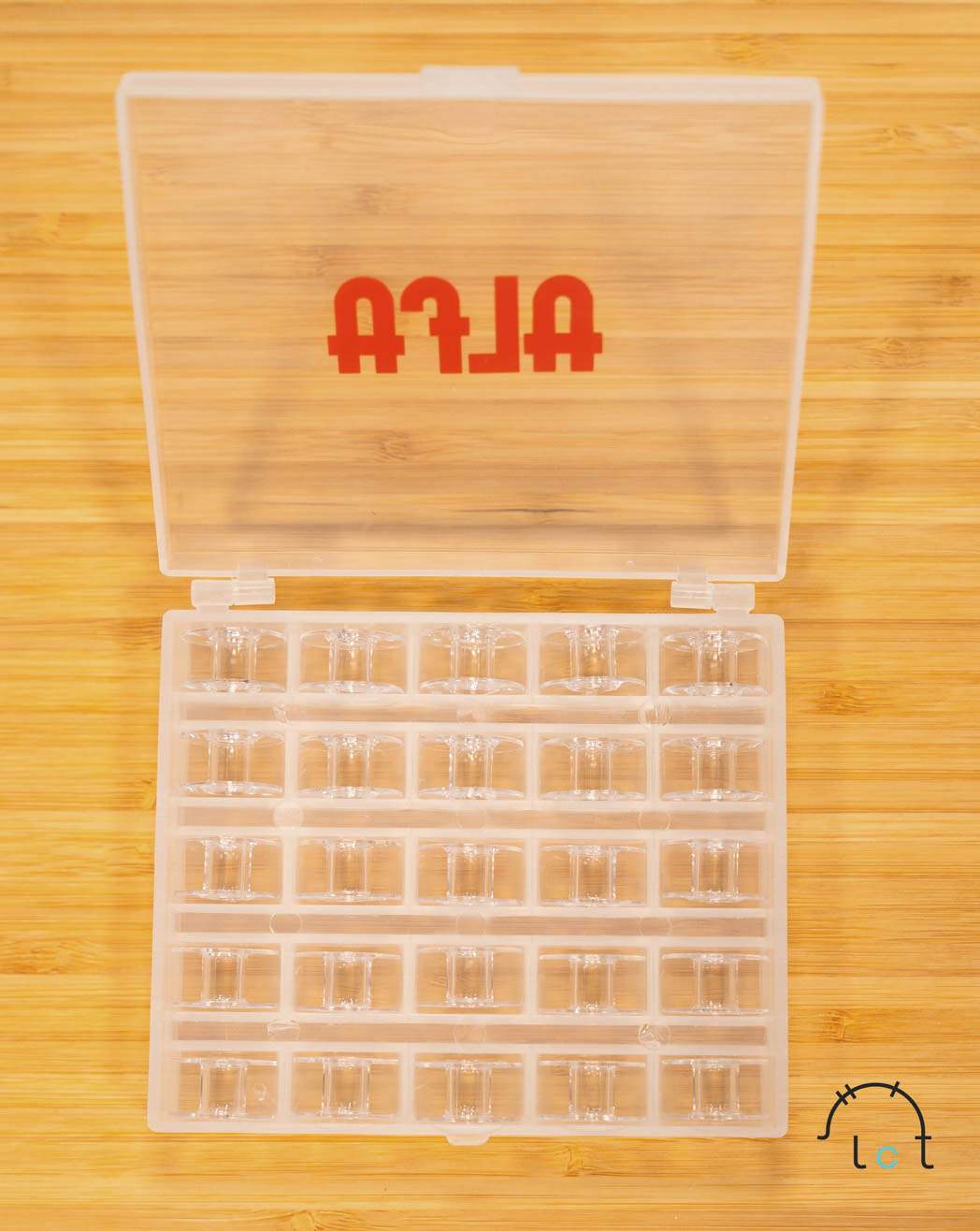 Mercería Online: Caja de canillas Alfa, incluye 25 canillas de plástico